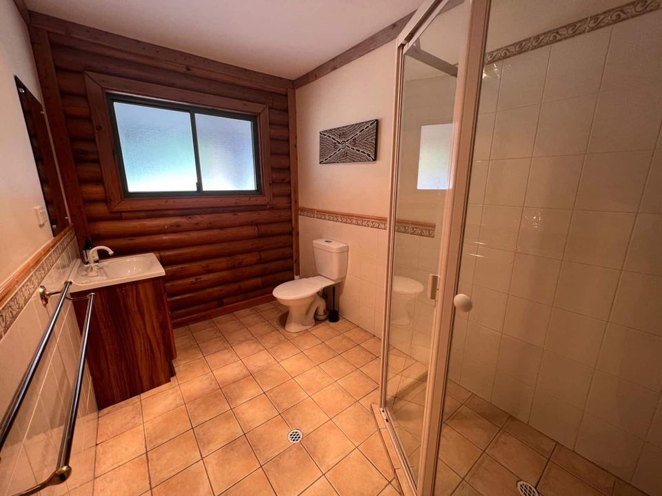 Timber-lined shower bathroom