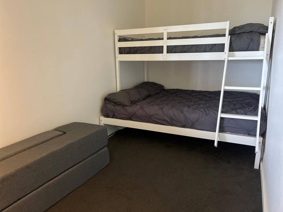 Bunk room with double-bottom bunk