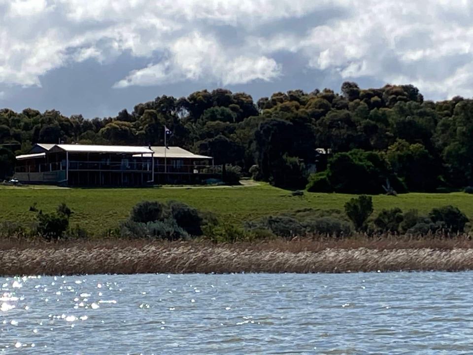 Black Swan Lake House seen across the water of Lake Alexandrina, Clayton Bay