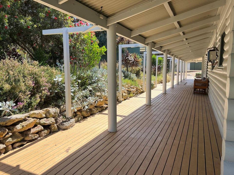 Timber verandah wrapping around the house